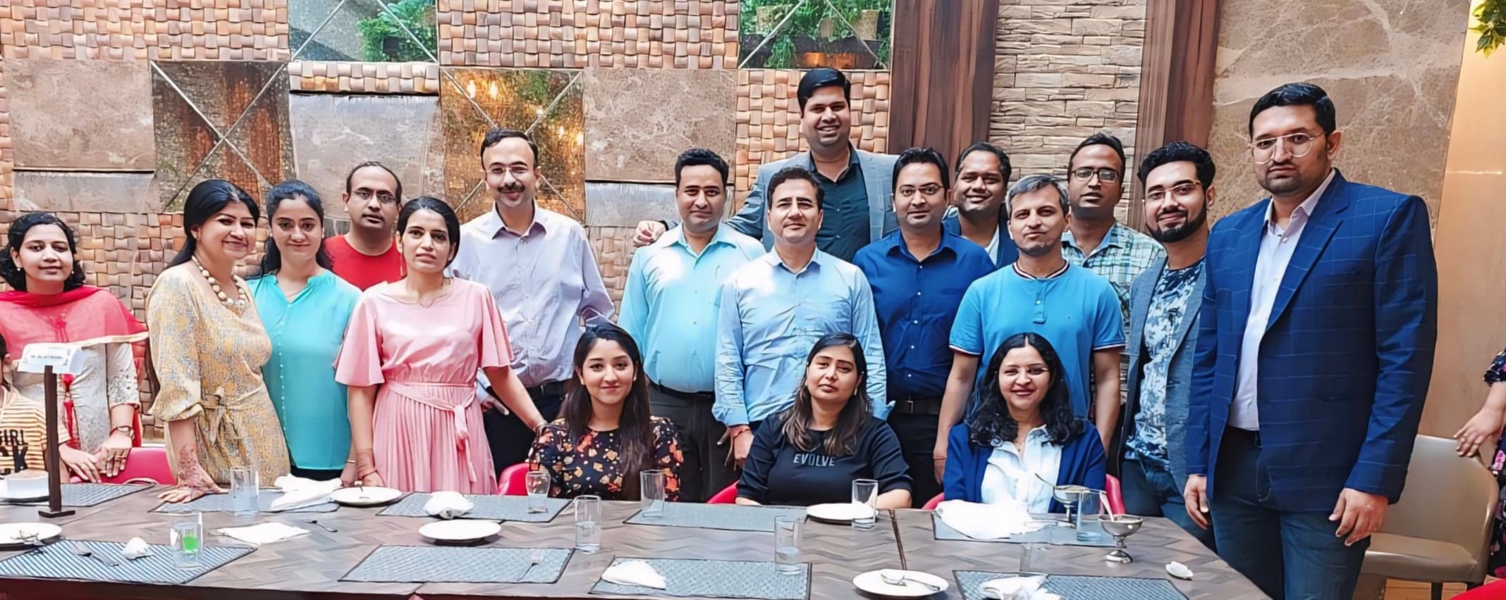 Dr. S. Hussain at medical conference doctors dinner with colleagues — vertical Vertical group photo of Dr. S. Hussain with physician colleagues at a medical conference dinner